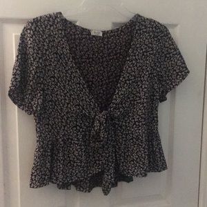 Patterned floral blouse with tie and ruffles